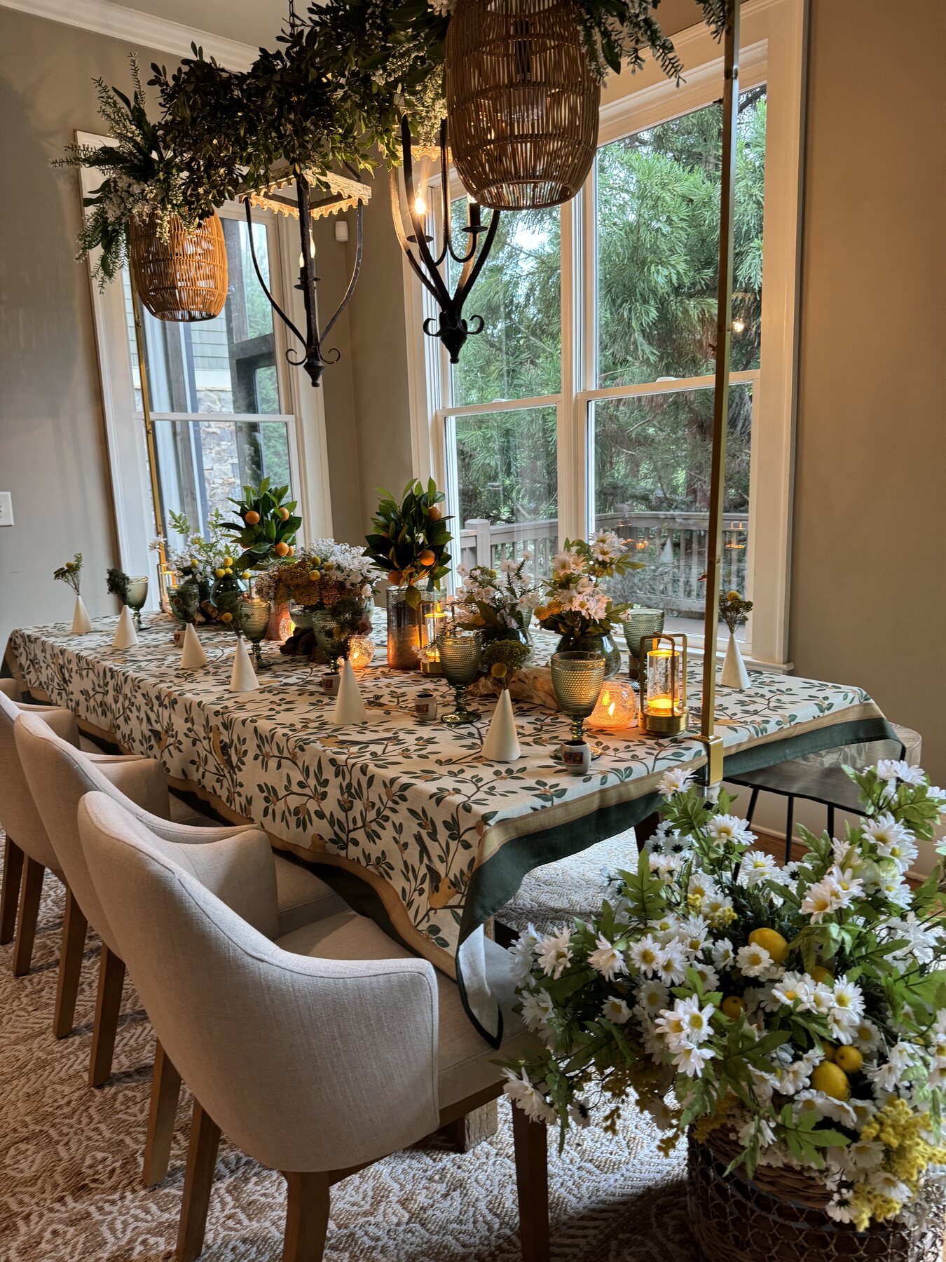 Botanical dining table with woven textures and abundant greenery